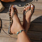 Flip-flops med leopardmønster og hjertevedhæng